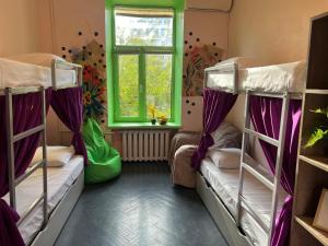 Postel nebo postele na pokoji v ubytování Amely Hostel