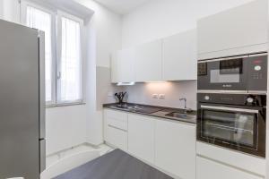 A kitchen or kitchenette at Aqua Claudia and Anio Novus Apartments
