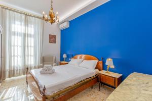 A bed or beds in a room at Aqua Claudia and Anio Novus Apartments