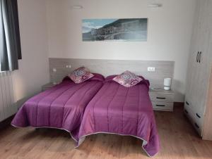 Łóżko lub łóżka w pokoju w obiekcie Hotel Rural Rio Molinar