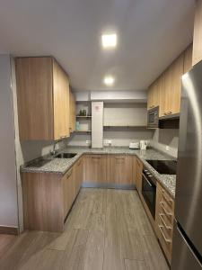 Kuchyňa alebo kuchynka v ubytovaní IV Apartamento junto a PLAZA MAYOR + 12 fotografií
