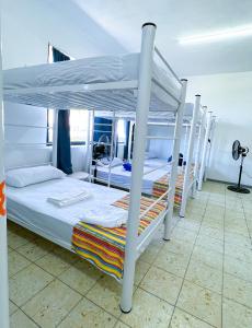 Postel nebo postele na pokoji v ubytování Vive Alegria Hostel
