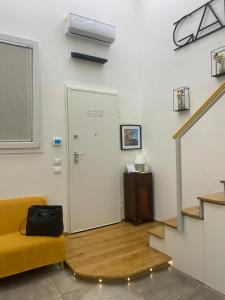 TV a/nebo společenská místnost v ubytování Silvano Cozy Loft