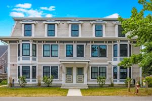 an exterior view of a large house at Fun in the Sun in Provincetown