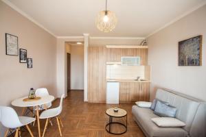 a living room with a couch and a table at Apartments Bogojevic in Ulcinj