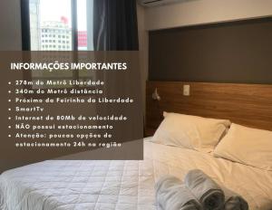 a poster of a bed in a hotel room at Shades of gray 5 in São Paulo