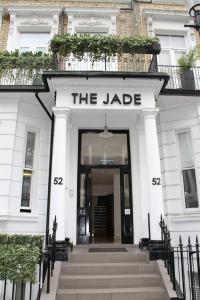 a large white building with the jade sign on it at The Jade in London