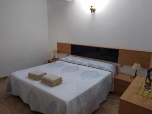 Katil atau katil-katil dalam bilik di Ca n'Antonia Mestre