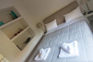 Giường trong phòng chung tại OAK apartment - Garden, Monodri