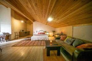 Кровать или кровати в номере Chalet Papa Basili