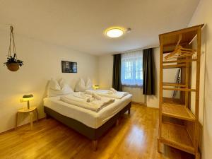 Posteľ alebo postele v izbe v ubytovaní Bauernchalet Alois