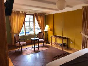 Posezení v ubytování Hotel Pisonay Pueblo