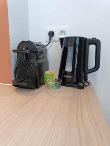 Utensilios para hacer té y café en Logement cosy hypercentre