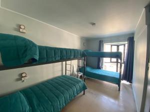 Postel nebo postele na pokoji v ubytování Hostel Cienfuegos