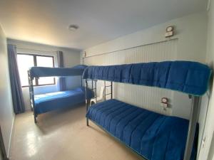 Postel nebo postele na pokoji v ubytování Hostel Cienfuegos