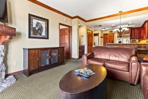 a living room with a couch and a table at Canyons Westgate Resort #4506 in Park City
