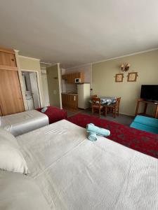 Cama o camas de una habitación en Apart hotel Terra Valdivia