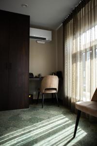 Posezení v ubytování Hotel de Koppelpaarden