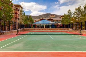 a tennis court in front of a house at Canyons Westgate Resort #4506 in Park City