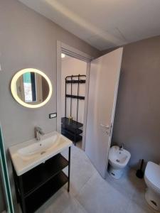 a bathroom with a sink and a toilet at S. GIACOMO DA L'ORIO in Venice