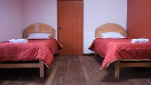 Postel nebo postele na pokoji v ubytování Casa Amaru Raqchi