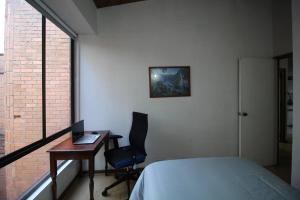 Фотография из галереи Apartamento cómodo y familiar en el Poblado - ALM в городе Медельин