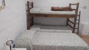 a couple of bunk beds in a room at Buena Vista in Salto
