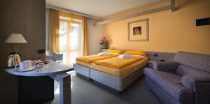 Postel nebo postele na pokoji v ubytování Hotel Marzia