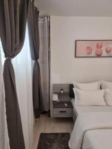 Postel nebo postele na pokoji v ubytování L'ilet Paradise