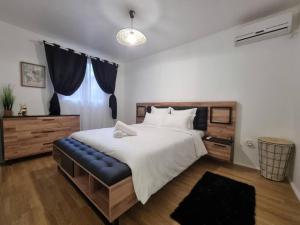 Postel nebo postele na pokoji v ubytování L'ilet Paradise