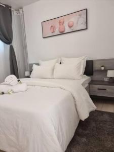 Postel nebo postele na pokoji v ubytování L'ilet Paradise