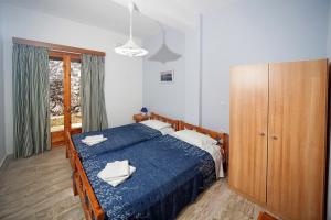 Posteľ alebo postele v izbe v ubytovaní Joanna Sea View Apartments