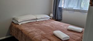 Postel nebo postele na pokoji v ubytování Methven Motel & Apartments