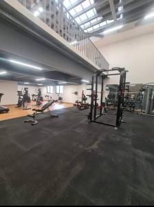 a gym with several tread machines in a room at Guatemala, departamento ciudad capital zona 12. in Guatemala