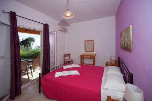 Posteľ alebo postele v izbe v ubytovaní Joanna Sea View Apartments
