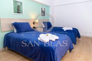Postel nebo postele na pokoji v ubytování Hotel San Blas