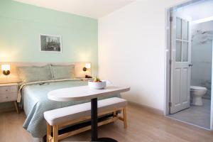 Postel nebo postele na pokoji v ubytování Hotel San Blas