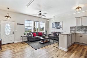 a living room with a couch and a table at Stylish Virginia City Apartment with Deck! in Virginia City