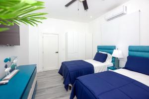 Voodi või voodid majutusasutuse Acqua di Mare Resort toas