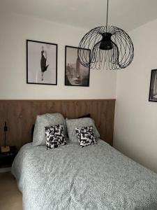 Posteľ alebo postele v izbe v ubytovaní Bastille Cosy Flat Paris