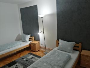 Postel nebo postele na pokoji v ubytování Lana
