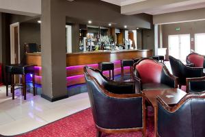 O lounge ou bar de Riverside Hotel