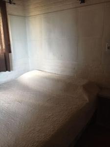 Posteľ alebo postele v izbe v ubytovaní Proa Amarilla