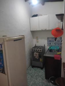 Virtuvė arba virtuvėlė apgyvendinimo įstaigoje Ap segunda praia