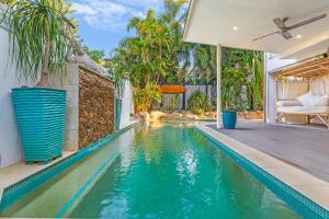an image of a swimming pool in a house at 'Villa Nalu' A Dreamy Fannie Bay Escape in Fannie Bay