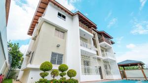 an image of an apartment building with a pool at Sky Blue in Jarabacoa