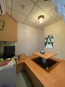 TV a/nebo společenská místnost v ubytování Wangyuku B&B