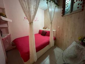 Postel nebo postele na pokoji v ubytování Wangyuku B&B