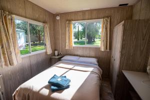 Voodi või voodid majutusasutuse Lazy Days Caravan Park toas