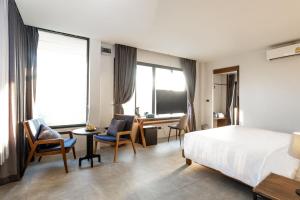 Postel nebo postele na pokoji v ubytování VIYA lodge